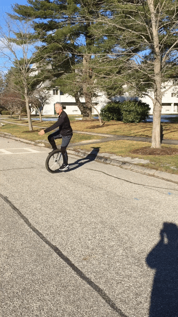 Doctor Herzog on monocycle